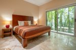 Your master suite with king bed, TV, patio and en suite bathroom